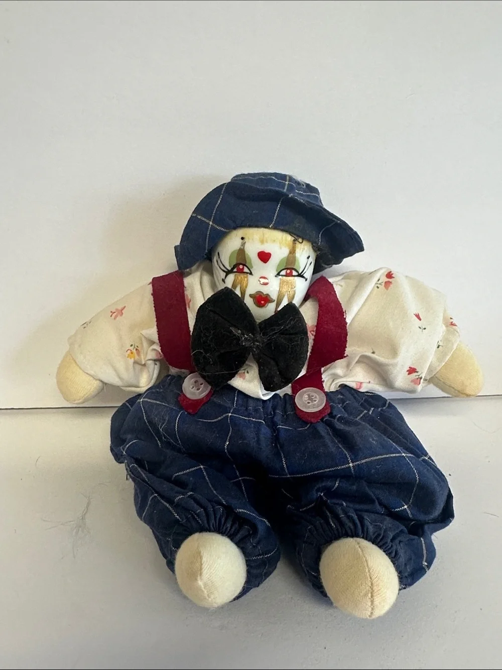 Plush Clown Doll in Blue Outfit with Black Bow